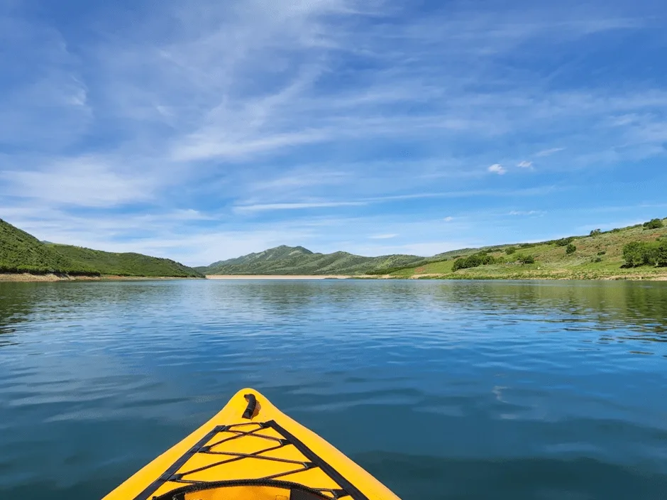 yellow kayak on lake