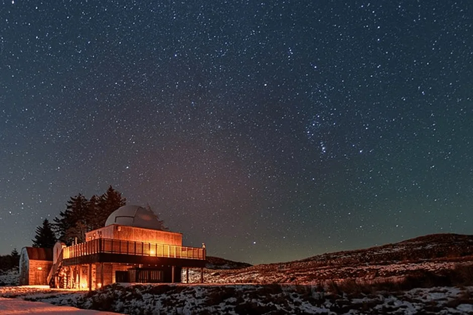 Telescope station at night with a sky filled with stars
