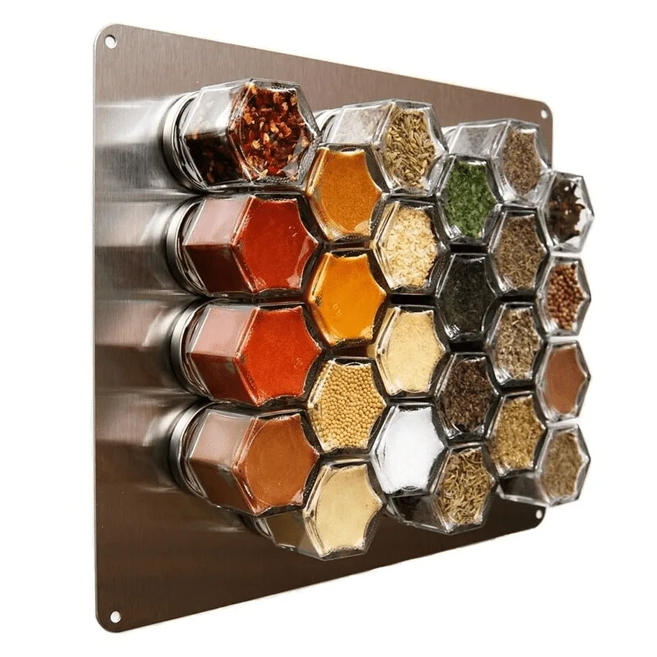 Spice rack filled with spices on magnetic board