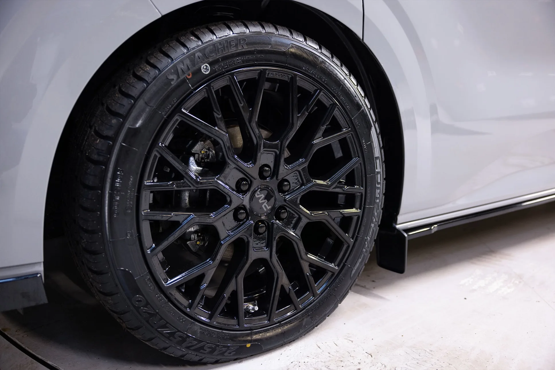 Close up of black camper van wheel