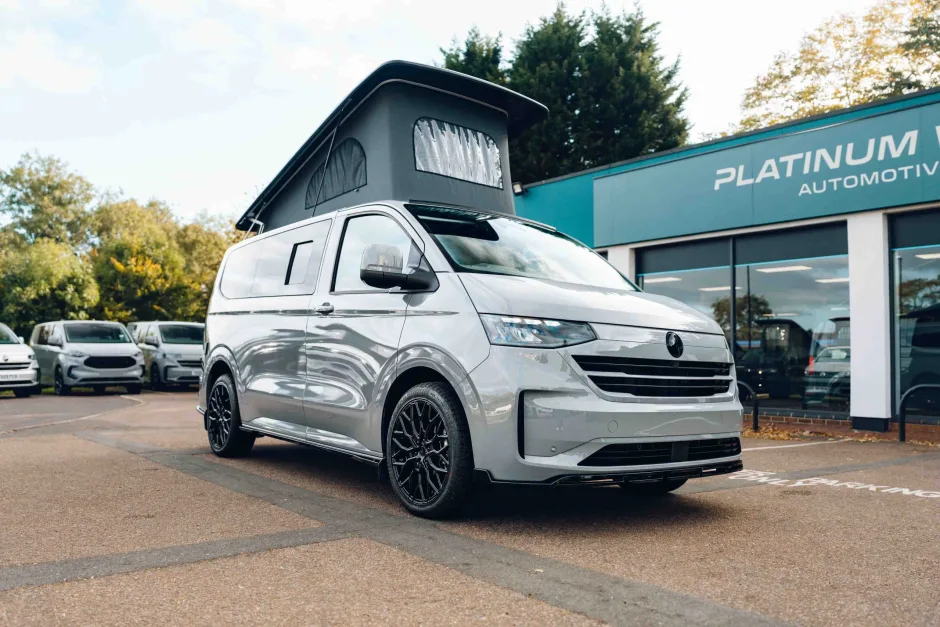 Grey van with pop top roof