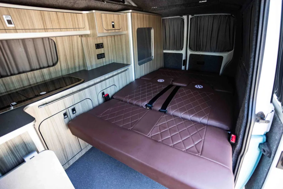 Camper van rock and roll bed