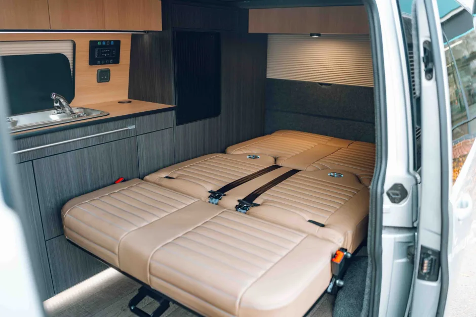 Camper van rock and roll bed