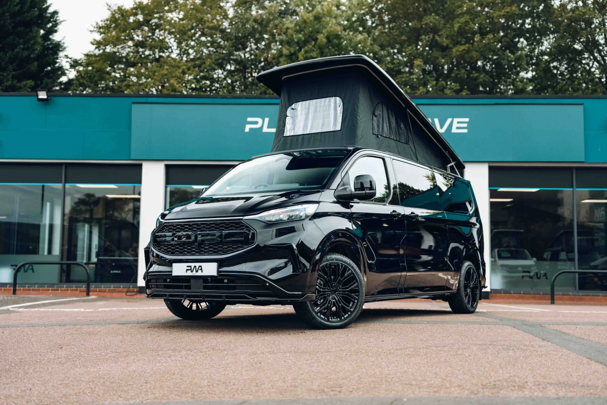 Ford campervan outside Platinum Wave Automotive