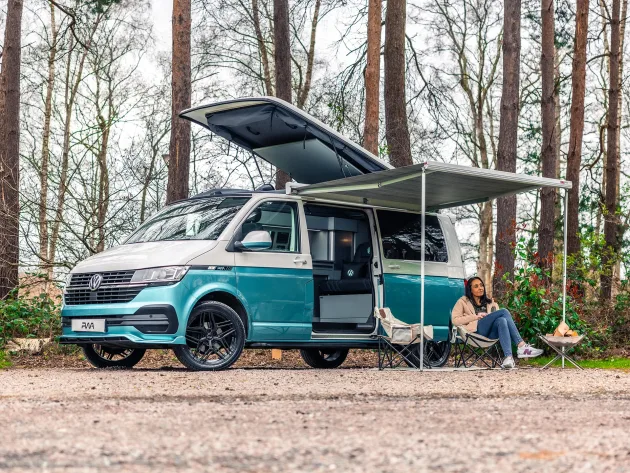 Awning attached to a platinum wave automotive campervan