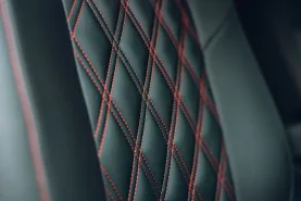 Details of seat stitching in a Platinum wave automotive Ford Campervan
