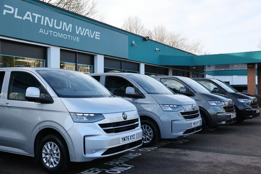 a row of VW Kombi vans outside PWA