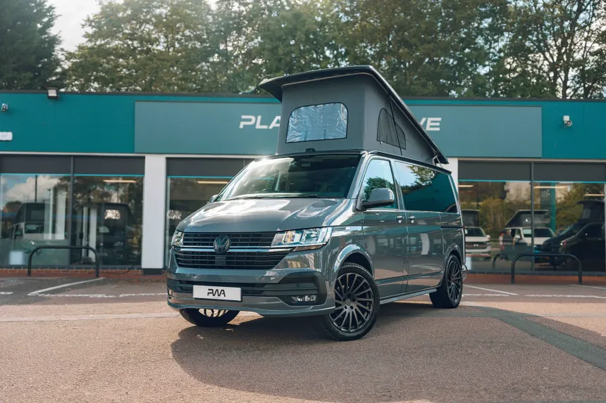 The outside of a Platinum Wave Automotive converted, VW Campervan