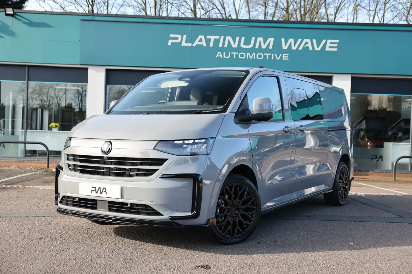 A VW Kombi van outside platinum wave automotive