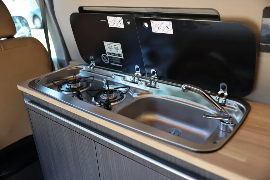 Sink and cooker inside a campervan
