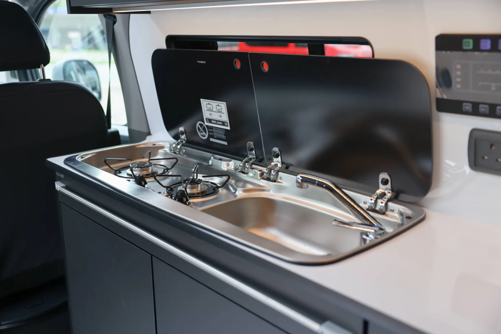 Sink and cooker inside a campervan