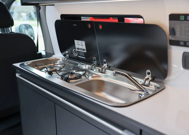 Sink and cooker inside a campervan