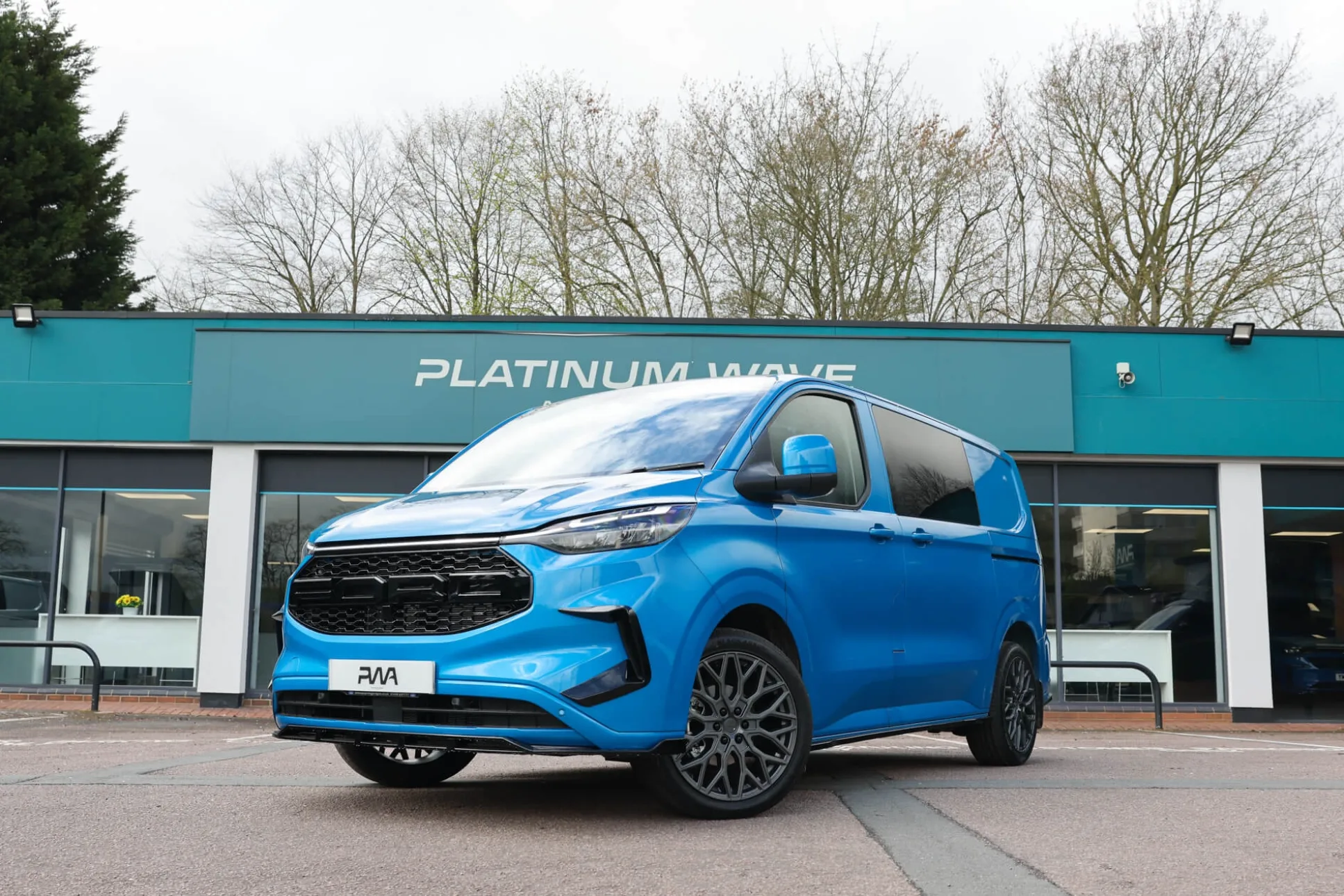 Blue Ford kombi van