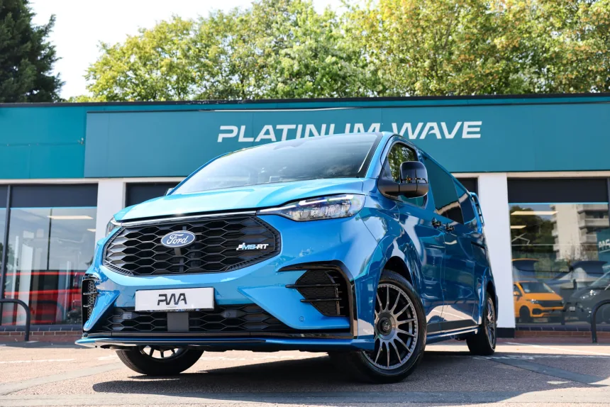 blue MRST kombi van outside Platinum Wave Automotive showroom