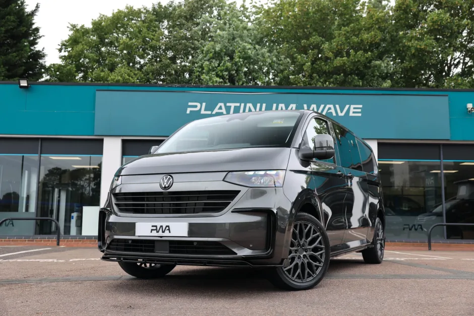 Black VW Kombi van outside Platinum Wave showroom